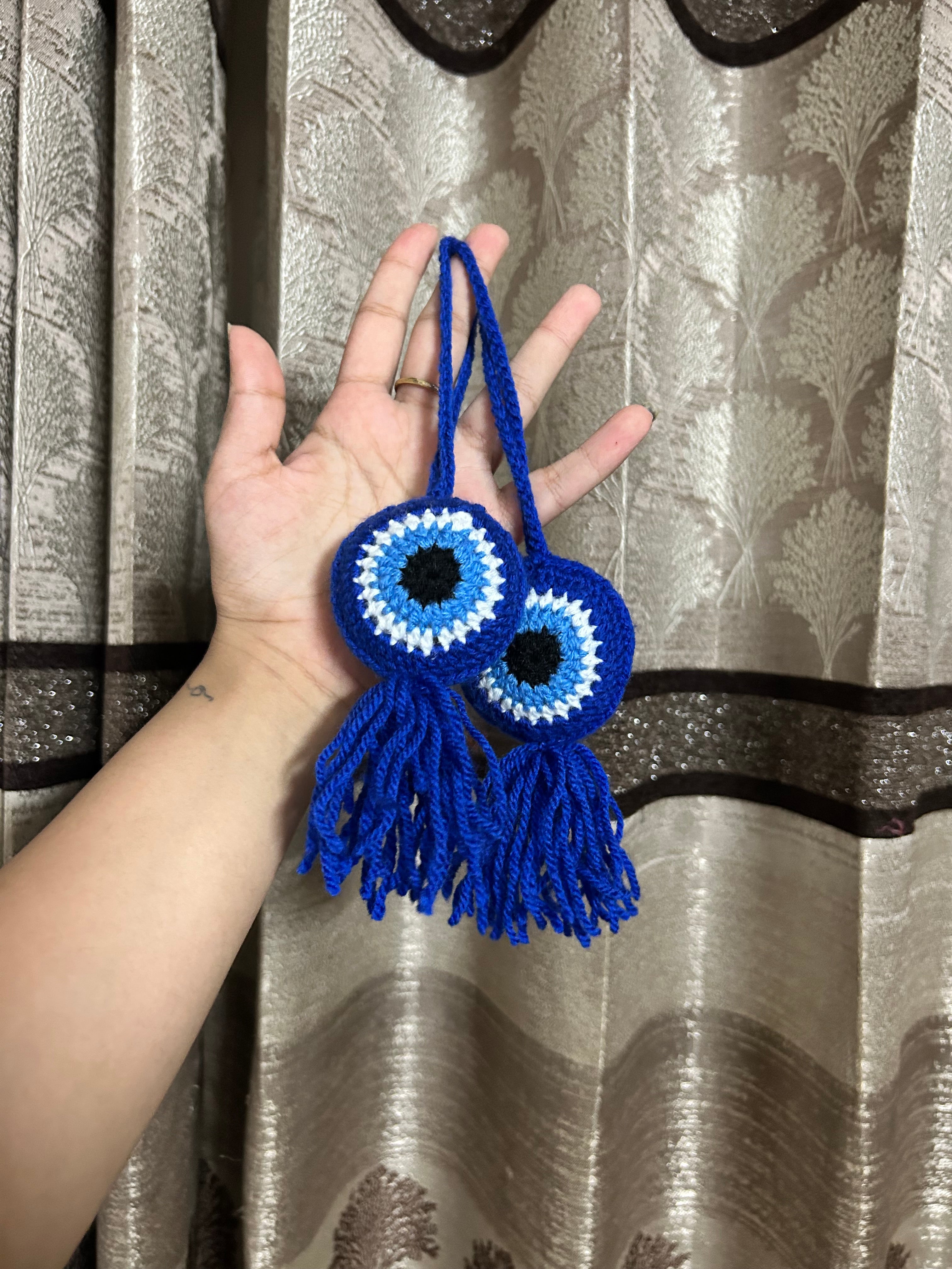 Evil eye charm
