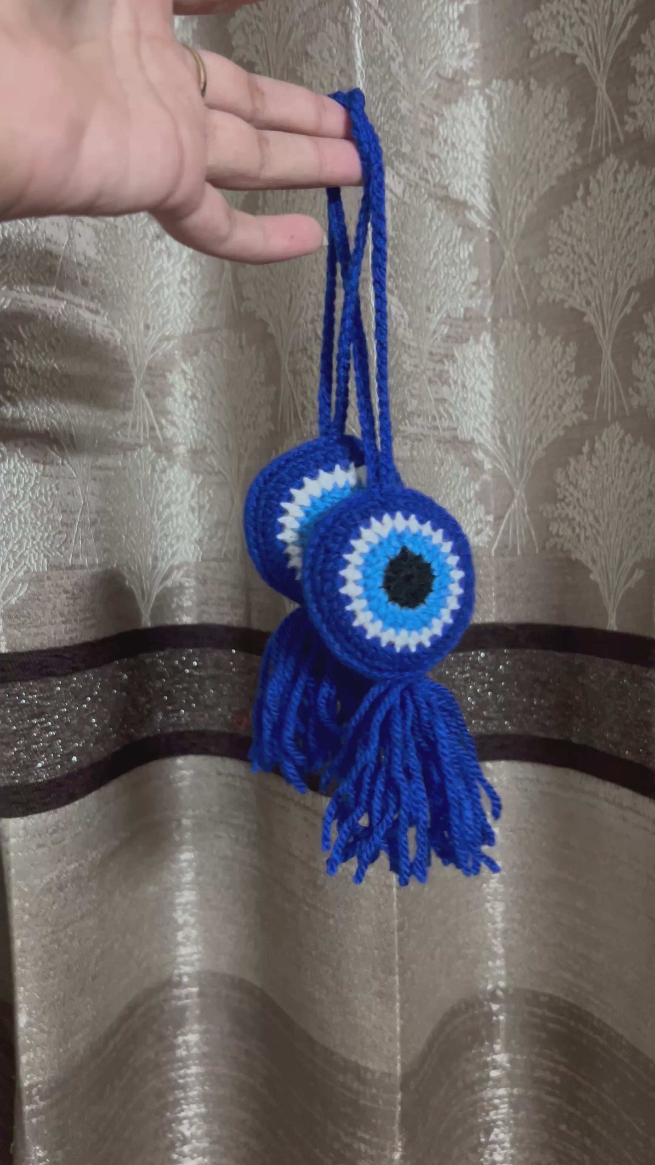 Evil eye charm